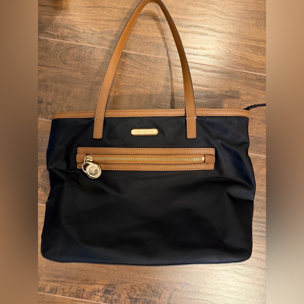 Michael Kors Black Tote with Brown Trim and Gold Hardware